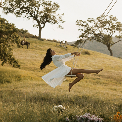Free woman on swing